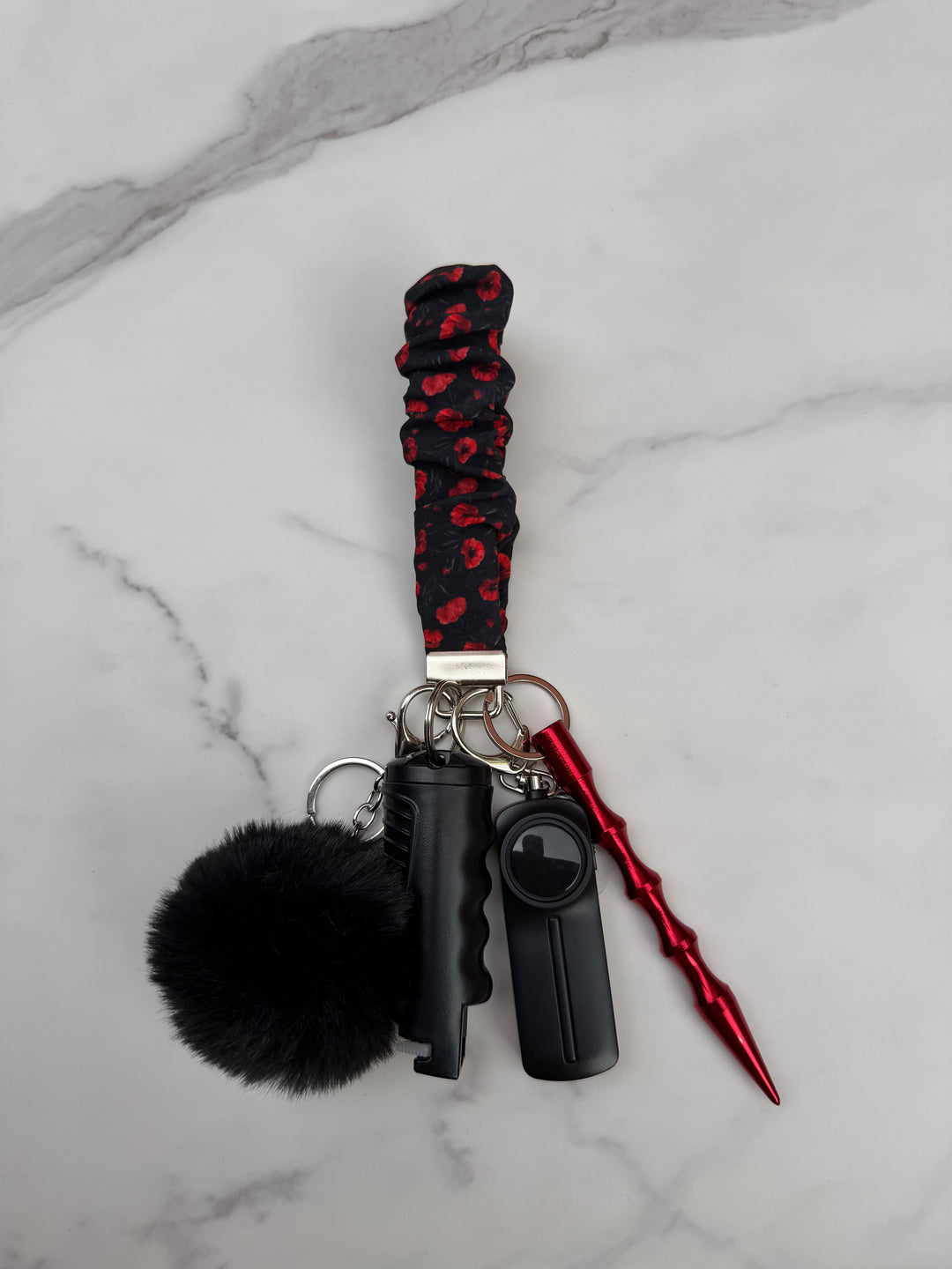 Handmade red poppy shell self-defense keychain