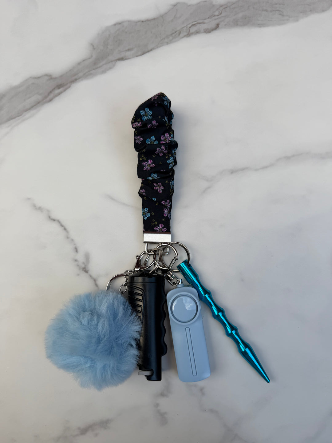 Handmade blue and black daisy scrunchie self-defense keychain