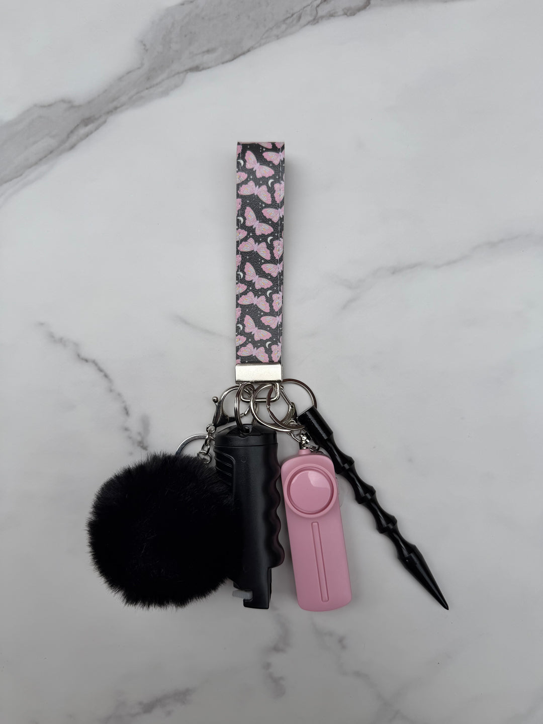 Handmade black and pink butterfly self-defense keychain