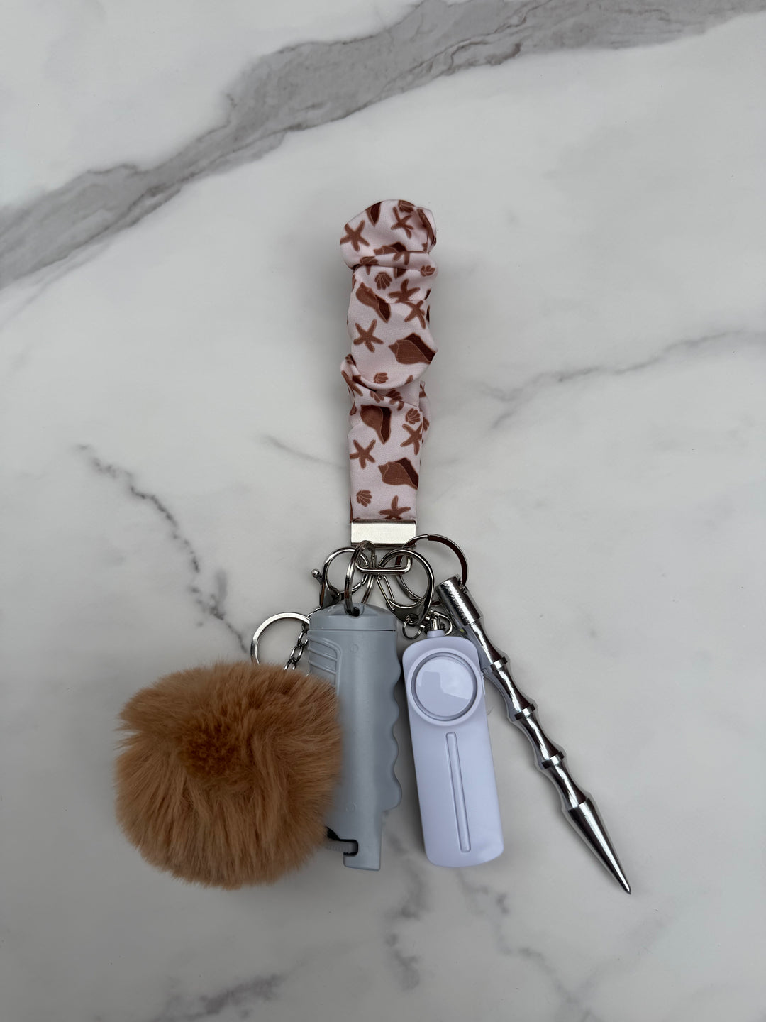 Handmade sandy shores self-defense keychain