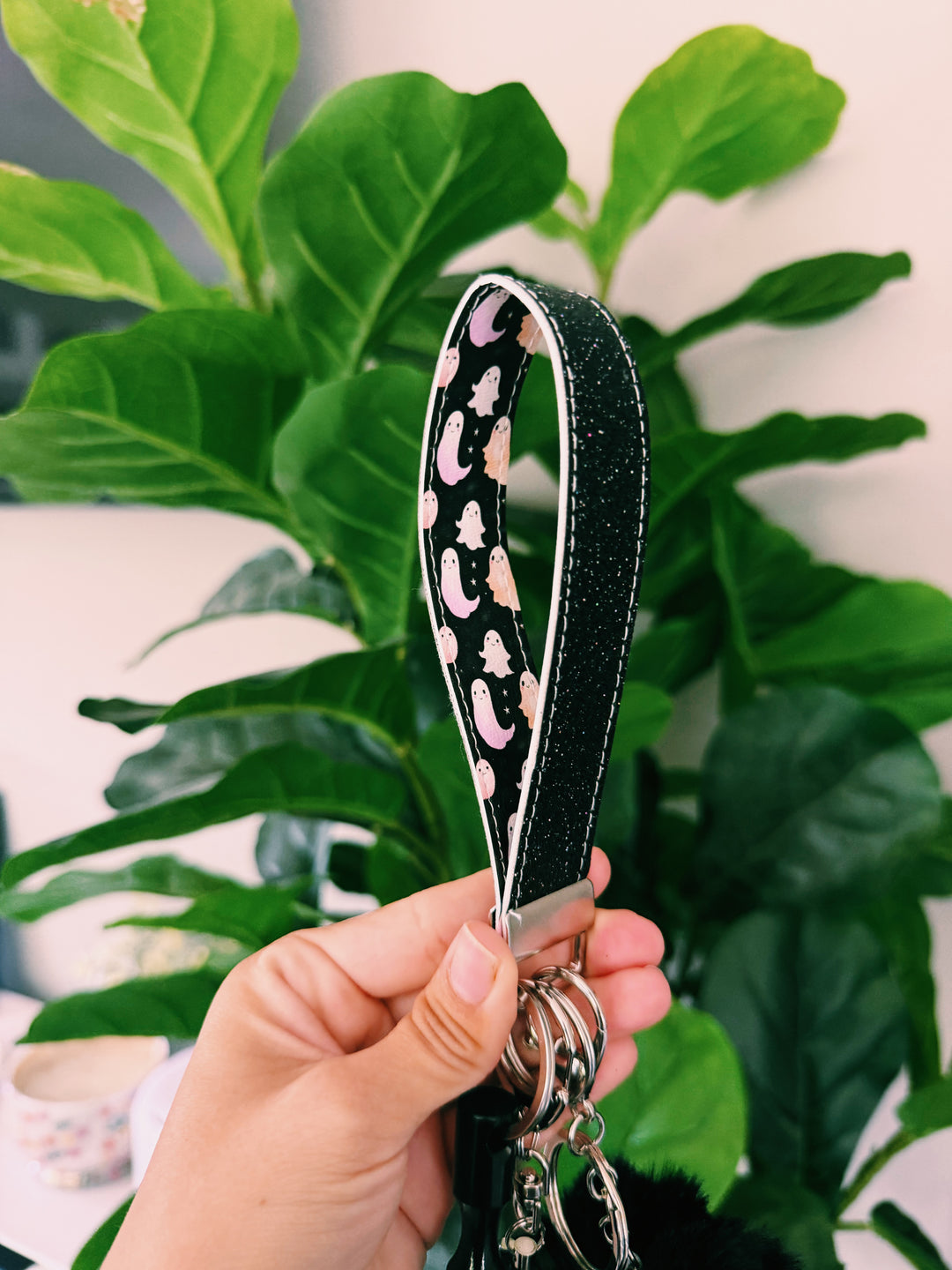 Handmade black ghost glitter self-defense keychain