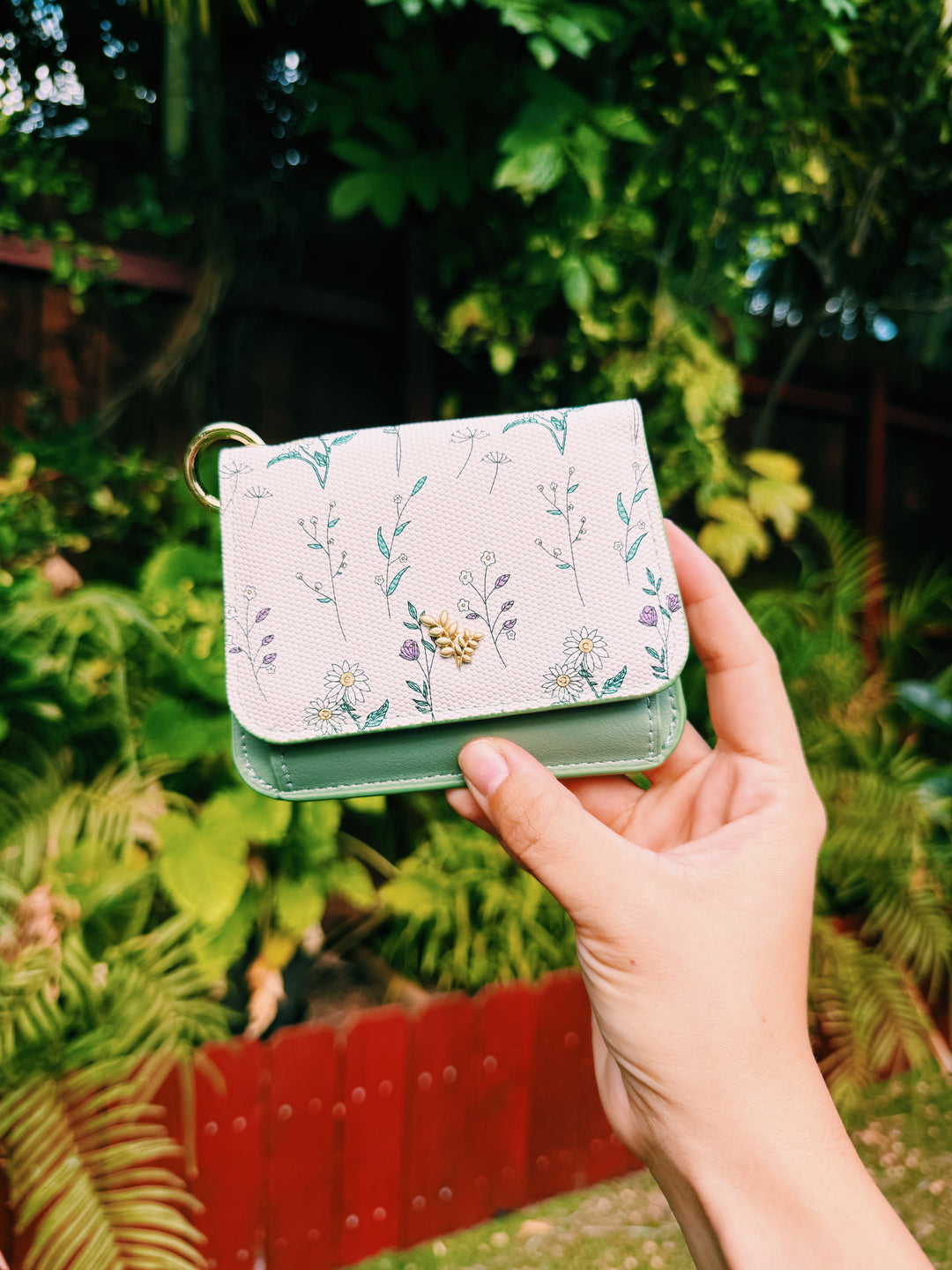 Cartera anillas pedrería