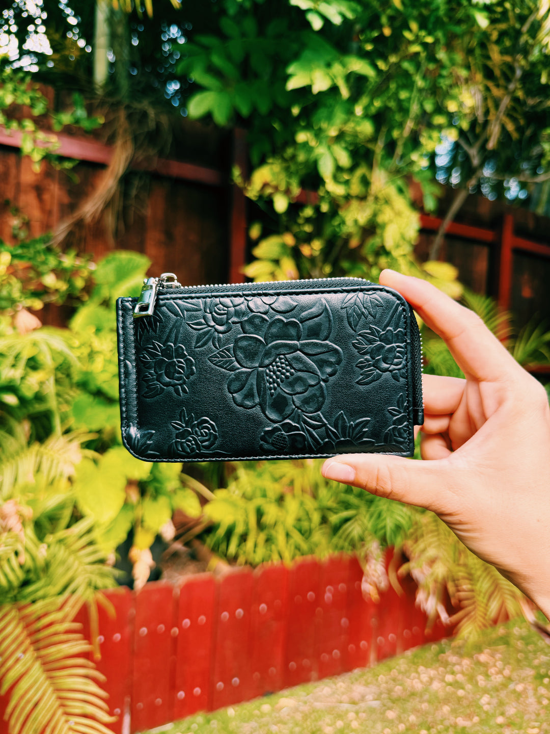 Black floral pouch