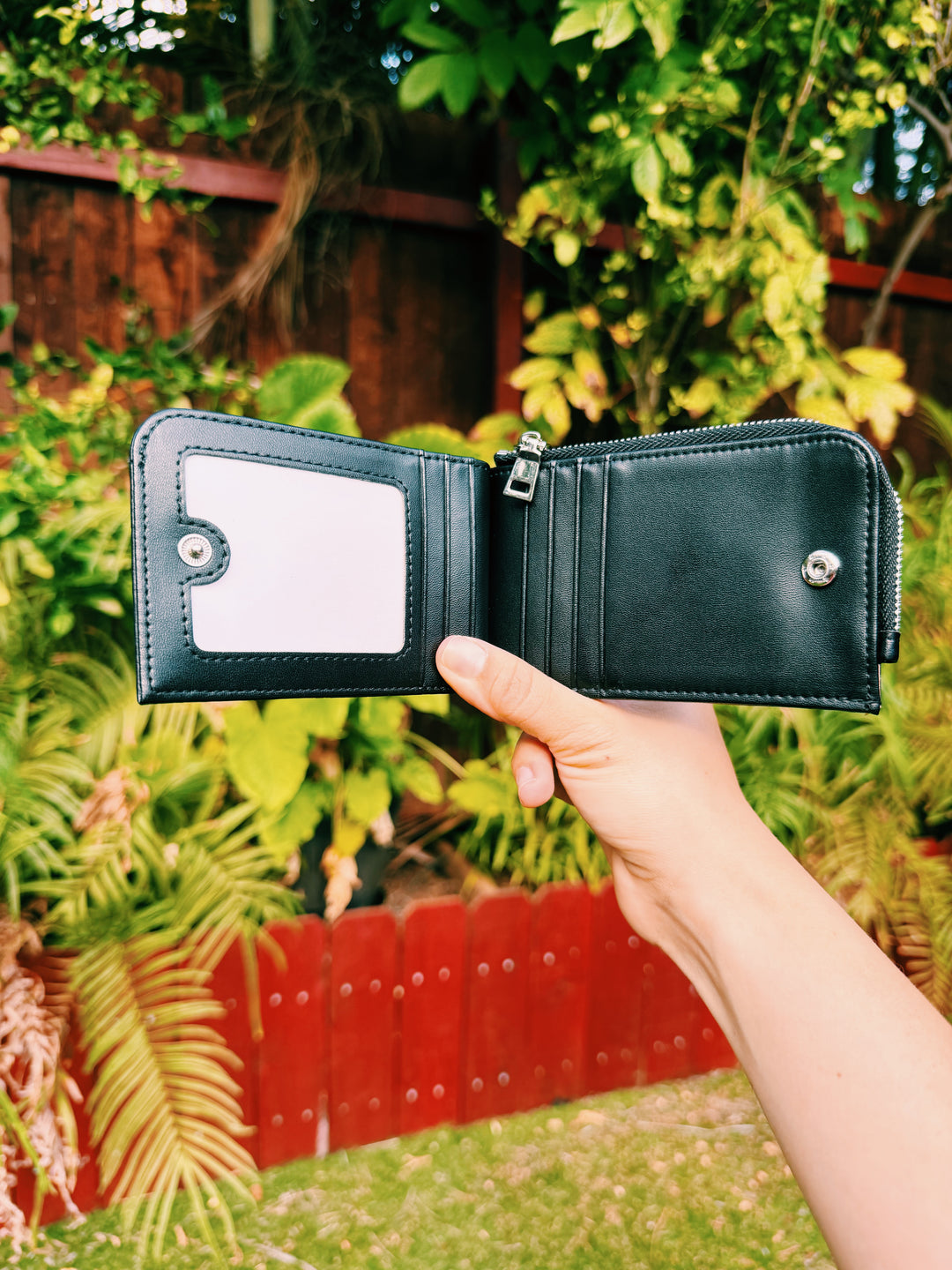 Black floral pouch