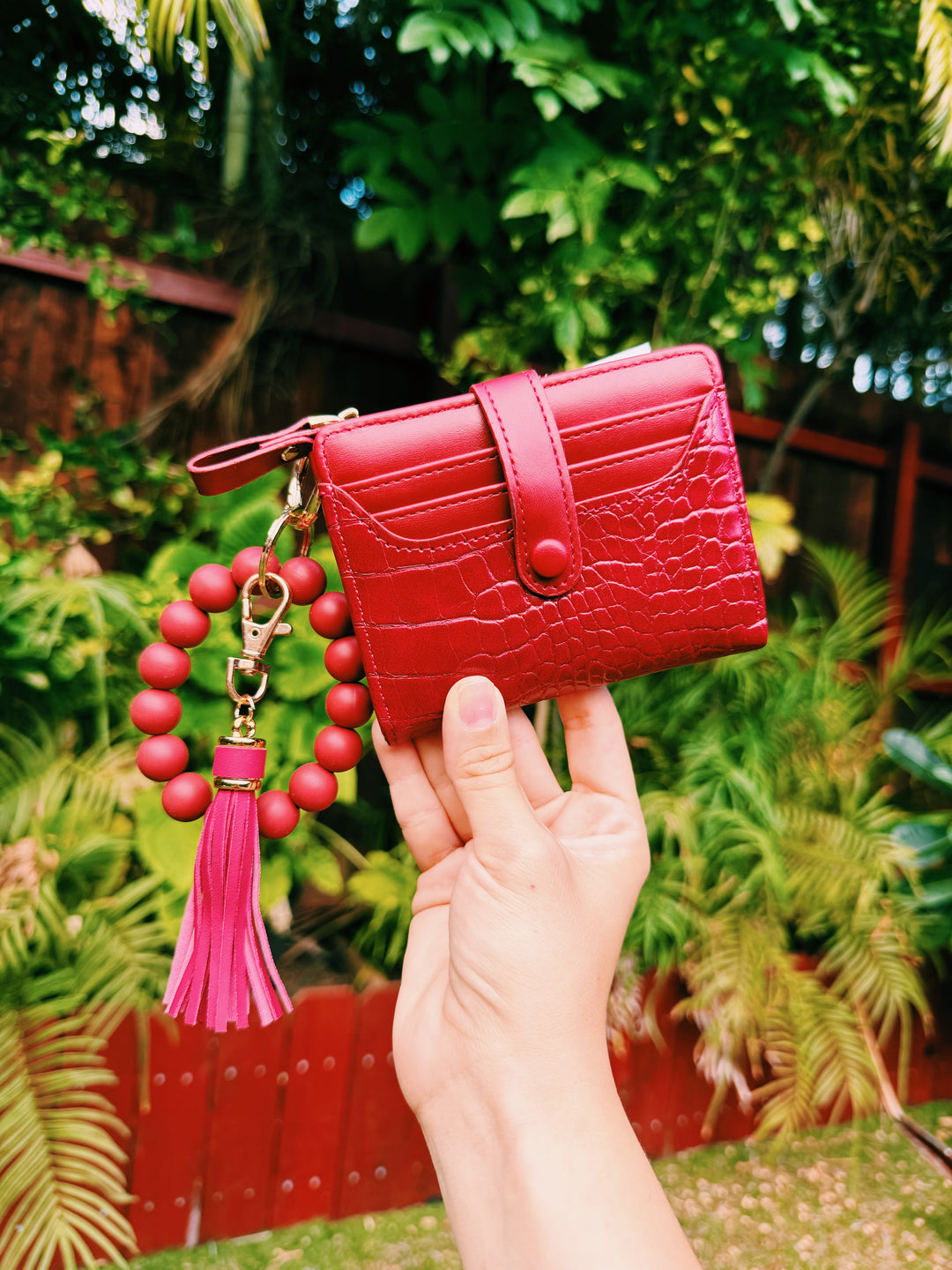 Red bifold textured beaded wallet