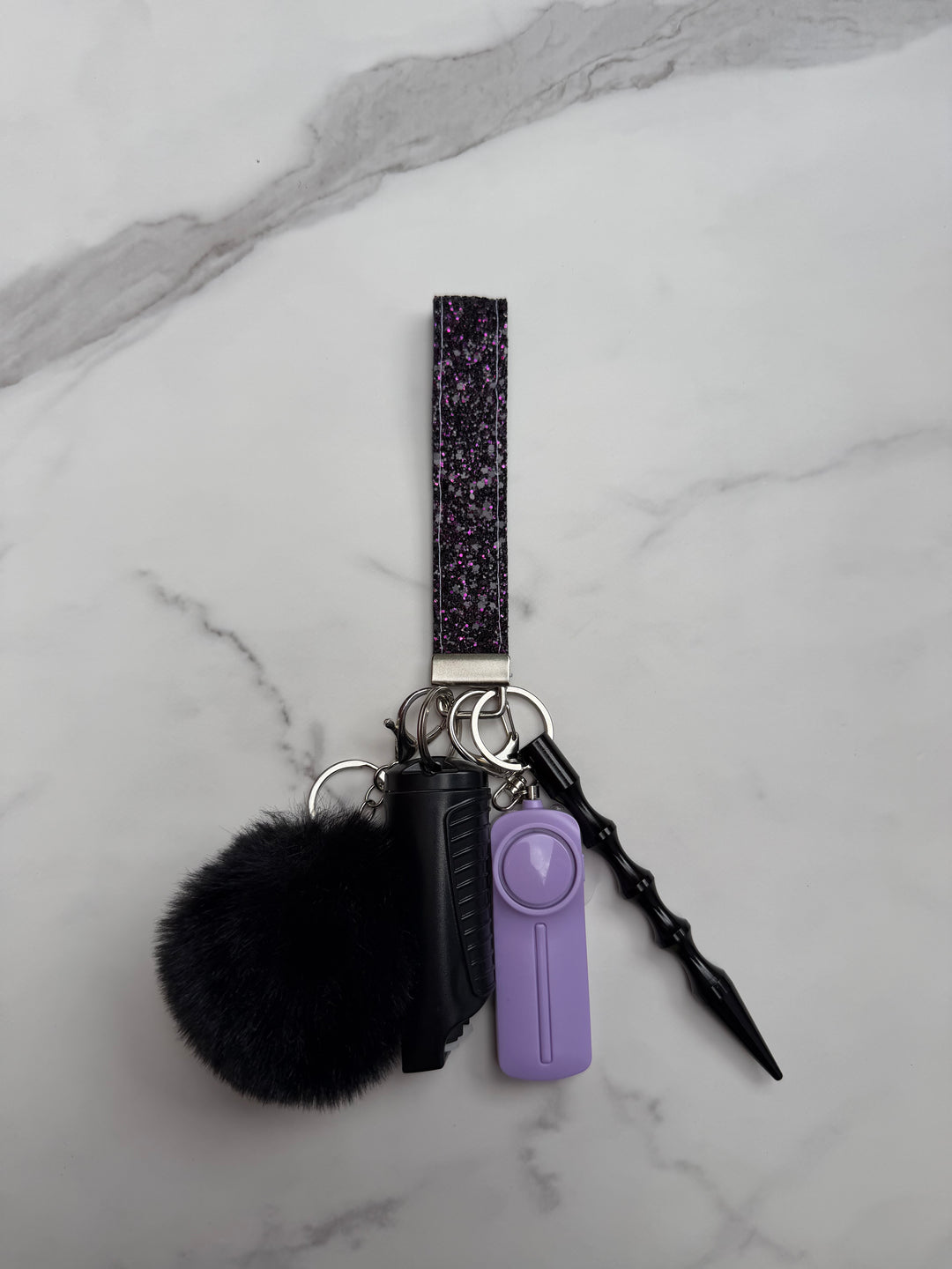 Handmade holographic purple glitter self-defense keychain